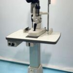 Side view of Topcon SL-3G slit lamp with joystick control
